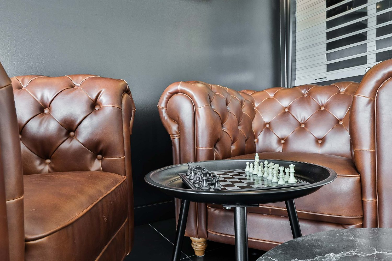 The lounge with its foosball table and captain chairs